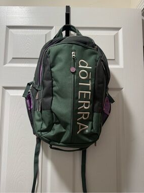 Doterra Green Backpack with Purple Accents